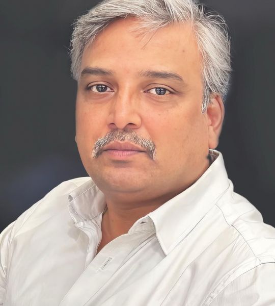 Dr. Purushotham B